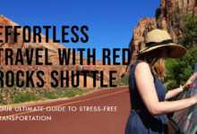 A traveler wearing a straw hat examines a map beside a road with majestic red cliffs under a clear blue sky, with text promoting Red Rocks Shuttle for effortless travel.