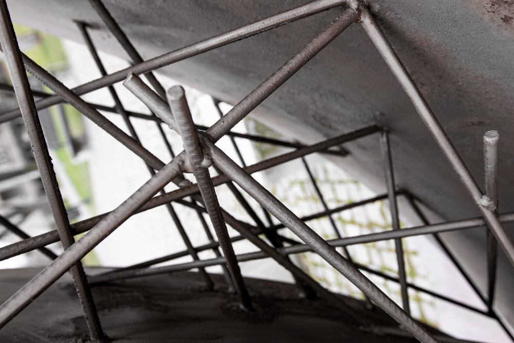 metal bars between concrete
