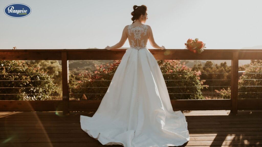 Professional wedding dress cleaning by Pennywise Cleaners preserving delicate bridal fabrics with expert wedding dress dry cleaning and stain removal.